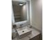 Modern bathroom featuring a stylish vessel sink, illuminated mirror, and a sleek faucet at 3303 Brigadoon Dr, Clearwater, FL 33759