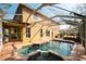 Wonderful swimming pool and screened-in patio area providing an outdoor sanctuary at 587 Lakewood Dr, Oldsmar, FL 34677