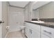 Bathroom featuring vanity, a tub with shower, and tile flooring at 6180 Apple Snail Ave, New Port Richey, FL 34653