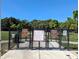 Community dog park with separate areas for large and small dogs and clear signage outlining park rules at 6210 92Nd N Pl # 3405, Pinellas Park, FL 33782