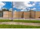 Outdoor racquetball court featuring well-maintained playing surfaces and chain-link fencing in a sunny setting at 6210 92Nd N Pl # 3405, Pinellas Park, FL 33782