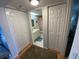 Practical bathroom with ample storage and direct access from the bedroom and hallway for convenience at 7050 Sunset S Dr # 208, South Pasadena, FL 33707