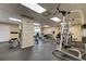 Fully equipped gym featuring a variety of exercise machines and equipment at 7050 Sunset S Dr # 208, South Pasadena, FL 33707