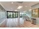 Spacious lobby with tiled floors, seating areas, and views of the outside at 7050 Sunset S Dr # 208, South Pasadena, FL 33707