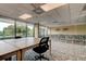 Meeting room with tables, chairs, and a scenic view at 7050 Sunset S Dr # 208, South Pasadena, FL 33707