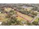 Expansive acreage with tree coverage, outlined to show property boundaries at 3009 Jim Johnson Rd, Plant City, FL 33566