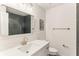 Bright bathroom features modern fixtures, a vanity, and a decorative mirror at 3009 Jim Johnson Rd, Plant City, FL 33566