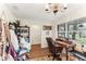 Home office showcasing a desk, ample lighting, and views of the outdoors at 3009 Jim Johnson Rd, Plant City, FL 33566