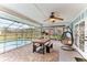 Screened-in patio area with view of the pool, furniture, and outdoor living space at 3009 Jim Johnson Rd, Plant City, FL 33566