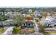 An overhead view of a home nestled in a residential neighborhood with mature trees at 431 Rafael Ne Blvd, St Petersburg, FL 33704