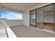 Covered balcony with a sliding glass door to the interior at 8421 Golden Beach Ct, Parrish, FL 34219