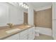 Modern bathroom featuring double sinks, white cabinetry, and a shower and bath combination at 8421 Golden Beach Ct, Parrish, FL 34219
