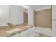 Bathroom with double sinks, bathtub and shower combination, and modern fixtures at 8421 Golden Beach Ct, Parrish, FL 34219