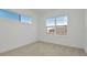 Neutral bedroom with windows at 8421 Golden Beach Ct, Parrish, FL 34219