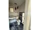 Bathroom with damaged walls and floors showcasing the need for renovation at 14236 Palm St, Madeira Beach, FL 33708