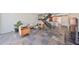 Inviting living room featuring tile flooring, comfortable seating, and an open layout that flows into the dining area at 2424 W Tampa Bay Blvd # B201, Tampa, FL 33607