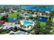 Gorgeous aerial view of the community pool and clubhouse featuring ample space for relaxation at 11616 Crest Creek Dr, Riverview, FL 33569