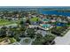 Beautiful aerial view of the community amenities including pool, clubhouse, playground, and lake at 11616 Crest Creek Dr, Riverview, FL 33569