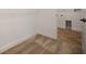 Walk-in closet featuring carpet and views of the laundry room with tile floors at 11892 Richmond Trl, Parrish, FL 34219