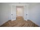 Bright foyer featuring light wood flooring and decorative double doors at 11892 Richmond Trl, Parrish, FL 34219