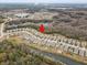 Aerial view of home in a lakeside community with a lake at 13456 Marble Sands Ct, Hudson, FL 34669