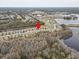 Aerial view of home in a lakeside community at 13456 Marble Sands Ct, Hudson, FL 34669