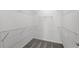 Walk-in closet with installed shelving and carpet flooring at 1975 Pepper Grass Dr, North Port, FL 34289