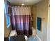 Bathroom with vanity and shower-tub combination with a shower curtain at 6919 Greenhill Pl, Tampa, FL 33617