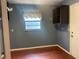 Cozy mud room features tile floors, a window with valance, and functional storage at 6919 Greenhill Pl, Tampa, FL 33617