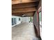 Spacious sunroom features a stained concrete floor, ceiling fans, and natural lighting at 6919 Greenhill Pl, Tampa, FL 33617