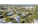 Aerial view showcasing the roof and lush trees in this neighborhood at 7312 7Th Nw Ave, Bradenton, FL 34209