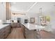 Modern kitchen boasts stainless steel appliances, island with barstool seating, and stylish cabinets at 1046 Bass Blvd, Dunedin, FL 34698