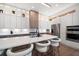 Modern kitchen with an island with barstool seating, stainless steel appliances, and stylish cabinets at 1046 Bass Blvd, Dunedin, FL 34698