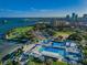 Expansive aerial shot of the beach area with a park, beach, and pool, showcasing a blend of nature and recreation at 216 21St Ne Ave, St Petersburg, FL 33704
