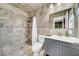 Bathroom features granite countertops, a vanity, and a shower at 216 21St Ne Ave, St Petersburg, FL 33704