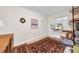 Bedroom area with rug, tv, and a dresser at 216 21St Ne Ave, St Petersburg, FL 33704