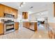 Well-equipped kitchen with stainless steel appliances, granite countertops, and ample wooden cabinetry at 216 21St Ne Ave, St Petersburg, FL 33704