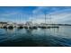 Picturesque marina featuring an array of modern boats and yachts reflected in calm, deep-blue water at 216 21St Ne Ave, St Petersburg, FL 33704