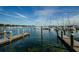 Beautiful marina with boats docked on wood pilings under a sunny blue sky at 216 21St Ne Ave, St Petersburg, FL 33704