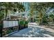 Charming restaurant entrance with outdoor seating, lush greenery, and sleek architectural details at 216 21St Ne Ave, St Petersburg, FL 33704