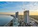 Aerial view of the waterfront property showcasing modern high-rise buildings at 2910 W Barcelona St # Ph-2303, Tampa, FL 33629