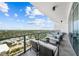 Spacious balcony with seating area showcasing panoramic city views at 2910 W Barcelona St # Ph-2303, Tampa, FL 33629