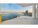 Expansive balcony featuring glass railings and breathtaking views of the bay at 2910 W Barcelona St # Ph-2303, Tampa, FL 33629