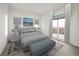 A well-staged bedroom with a king-sized bed and a view at 2910 W Barcelona St # Ph-2303, Tampa, FL 33629