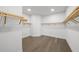 Large walk-in closet with built-in shelving and ample storage space at 2910 W Barcelona St # Ph-2303, Tampa, FL 33629