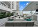 Inviting courtyard with lounge seating and lush landscaping at 2910 W Barcelona St # Ph-2303, Tampa, FL 33629