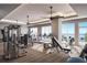 Well-equipped fitness center with modern exercise machines and panoramic views of the surrounding area at 2910 W Barcelona St # Ph-2303, Tampa, FL 33629