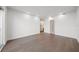 Spacious living room features hardwood floors and large windows with a contemporary, open layout at 2910 W Barcelona St # Ph-2303, Tampa, FL 33629