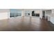 Bright living room with wood floors and floor to ceiling windows with bay views at 2910 W Barcelona St # Ph-2303, Tampa, FL 33629