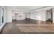Open concept living room and kitchen with white cabinets and stainless steel appliances at 2910 W Barcelona St # Ph-2303, Tampa, FL 33629